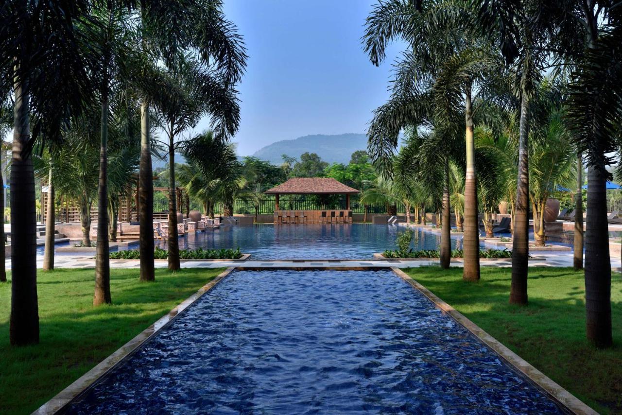 Radisson Blu Plaza Resort & Convention Centre Карджат Экстерьер фото The pool at the Anantara Golden Triangle Resort